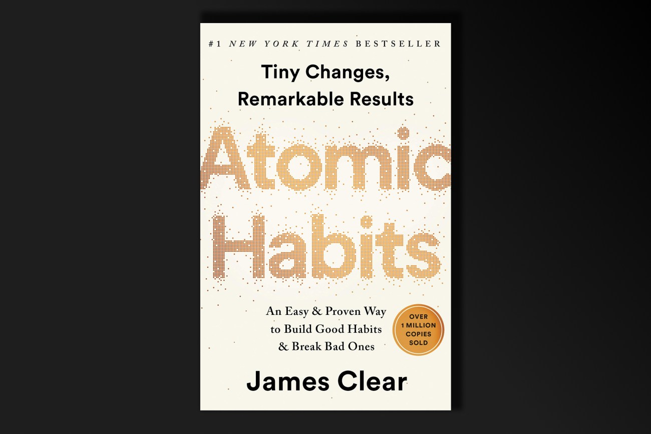 a cream book cover art with the title: New York Times Bestseller Atomic Habits 
