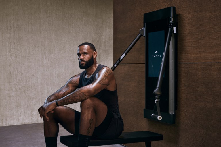 LeBron James sitting in front of a Tonal post-workout