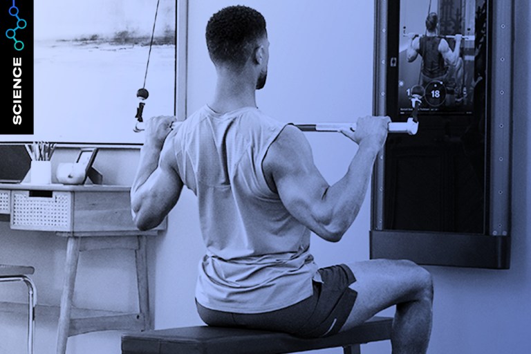 Image of man performing a lat pull-down exercise at heavy load in connection to study showing reduced body fat