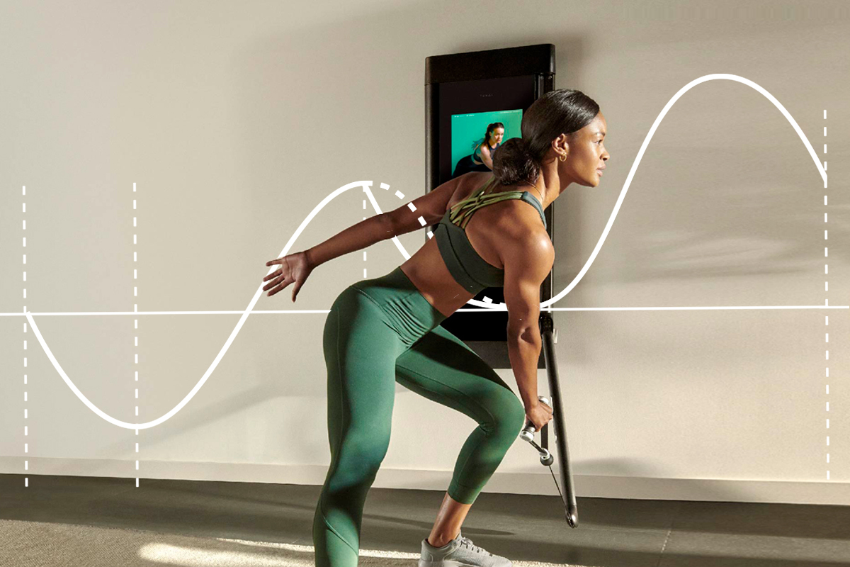 Image of a woman working out on Tonal to highlight a story focused on stress adaptation.