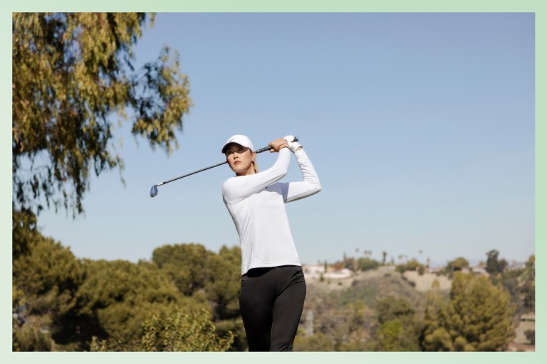 Michelle Wie West swinging a golf club.