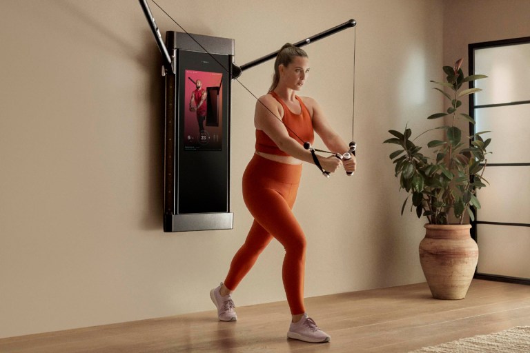 Woman performing strength training during weight loss to improve body composition