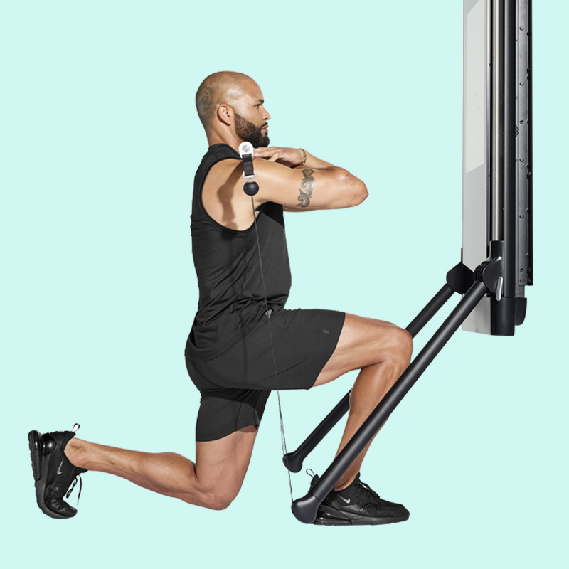 Barbell front racked split squat on Tonal's all-in-one home gym.