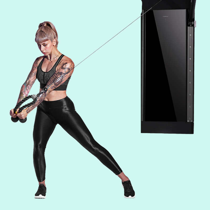 Rotational chop on Tonal's all-in-one home gym.
