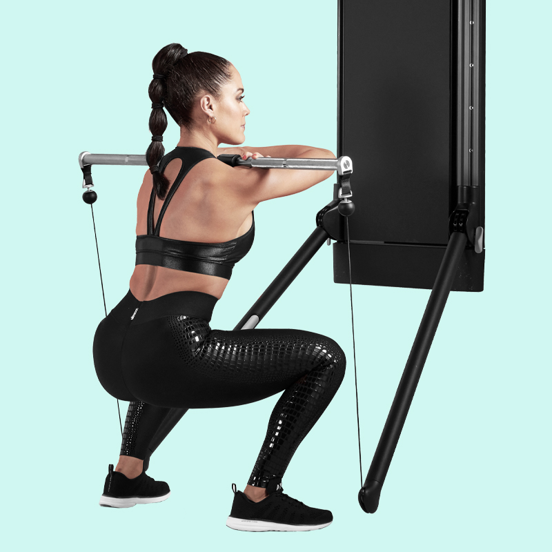 Barbell front squat on Tonal's all-in-one home gym.